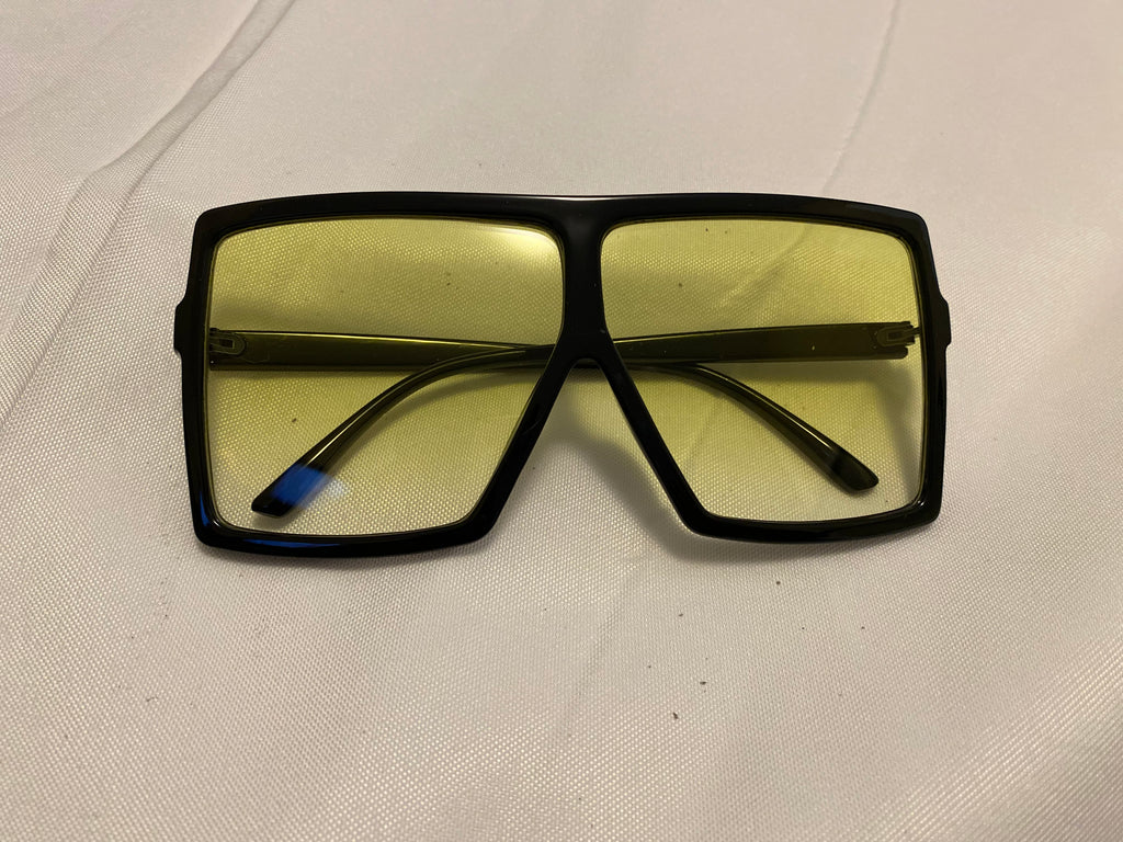 Black glasses with yellow shades